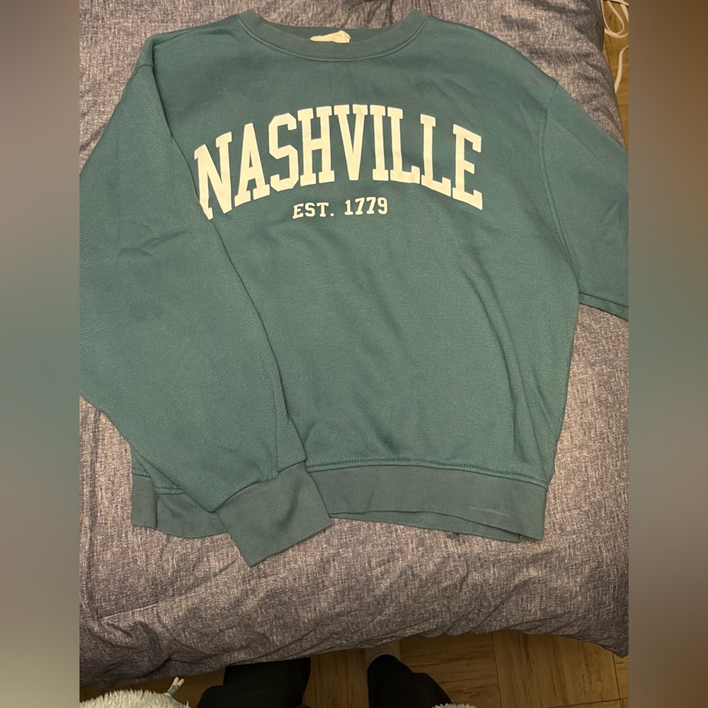 Blue Altar’d State crewneck, size medium.